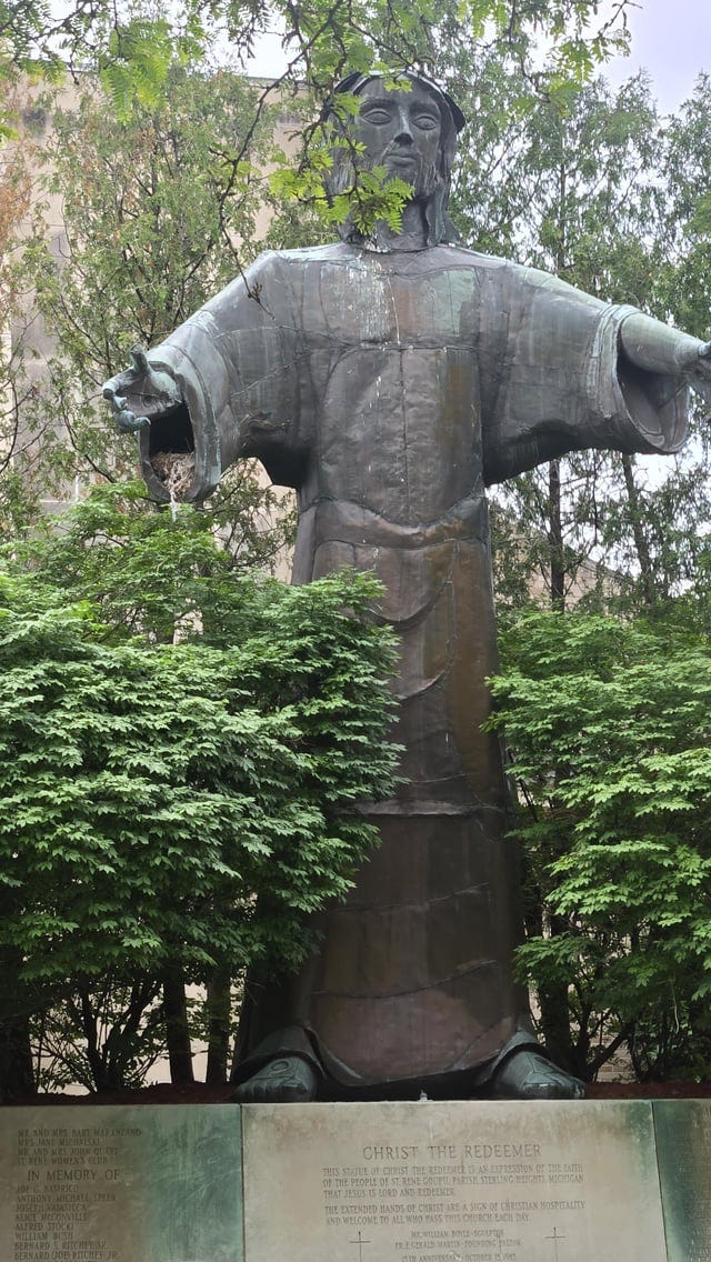 r/mildyinteresting - Bird nest in a statue of Jesus