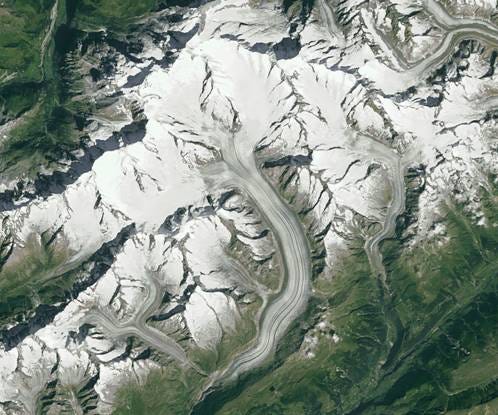 Aerial view of a snowy mountain

AI-generated content may be incorrect.