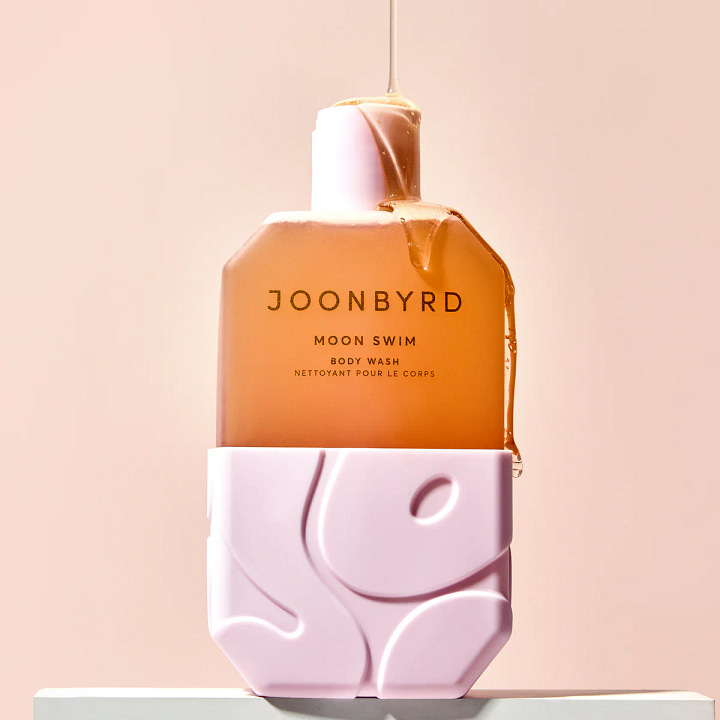 Joonbyrd Sunday Sofa Body Butter and Moon Swim Body Wash in aesthetic silicone packaging.
