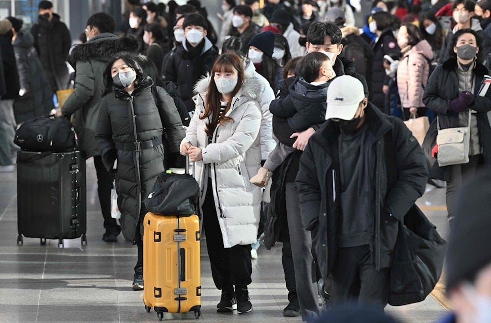 Passengers walk through a Seoul railway station ahead of the Lunar New Year holidays, Seoul, South Korea, Jan. 20, 2023. (AFP Photo) Passengers walk through a Seoul railway station ahead of the Lunar New Year holidays, Seoul, South Korea, Jan. 20, 2023. (AFP Photo)