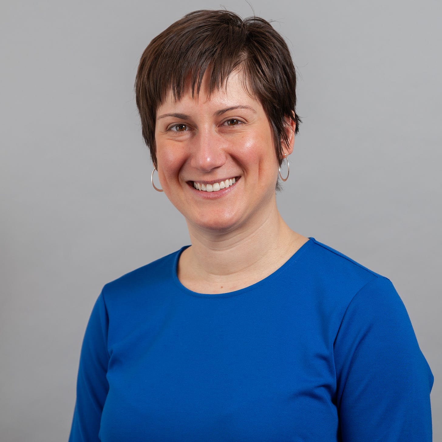 Picture of Dr. Hannah Miller in a blue shirt