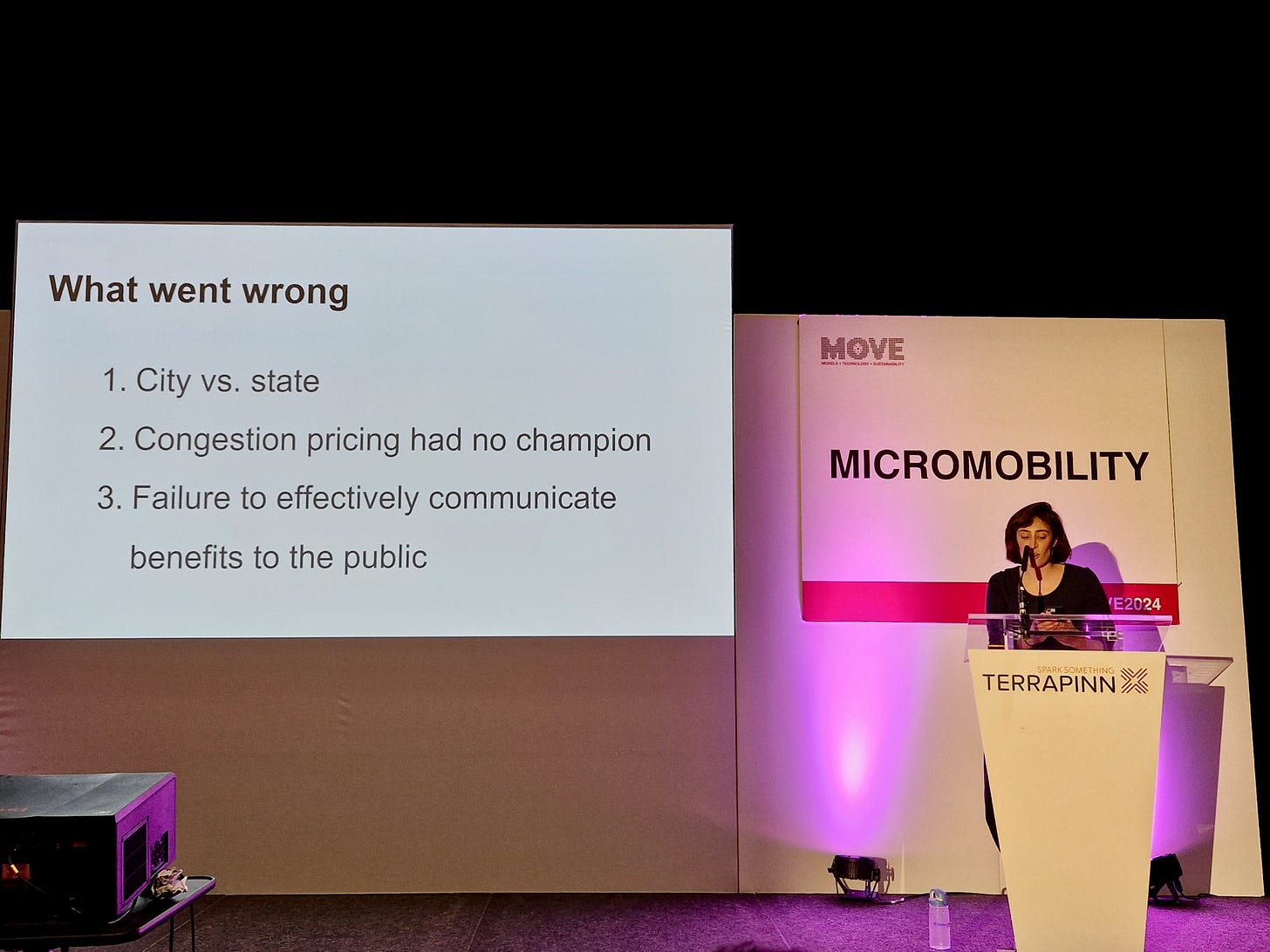 Photo of me speaking at MOVE 2024