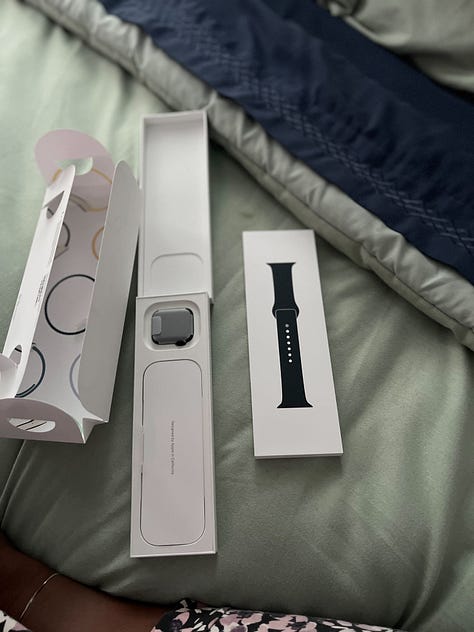 Image 1: Black and white panoramic photos documenting American history through the 70's|| My Apple Watch that I bought from the Carnegie Store|| Opened copy of Fourth Wing while I was reading it || An old Panoramic camera|| Negative film of a photo lined up with it's print|| the welcome area at the Apple store where people learn about Apple products