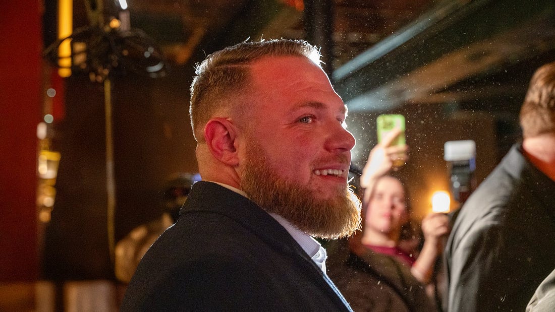 May be an image of one or more people, beard and lighting