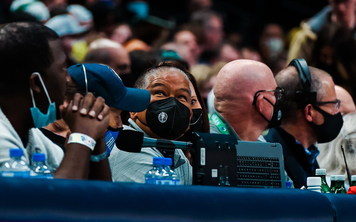 Tim Fontillas behind the scorer's table at a Dallas Mavericks game in 2022.
