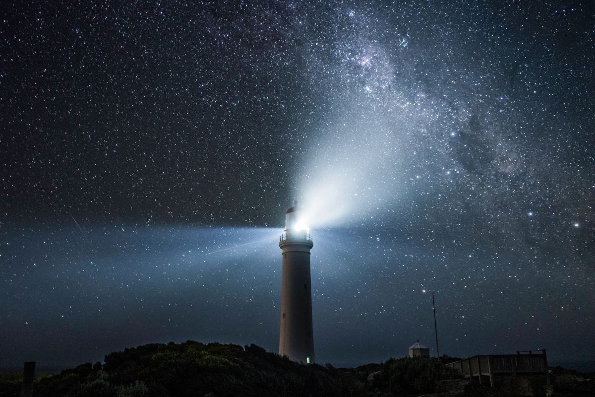 A lighthouse shining in the darkness A lighthouse shining in the darkness