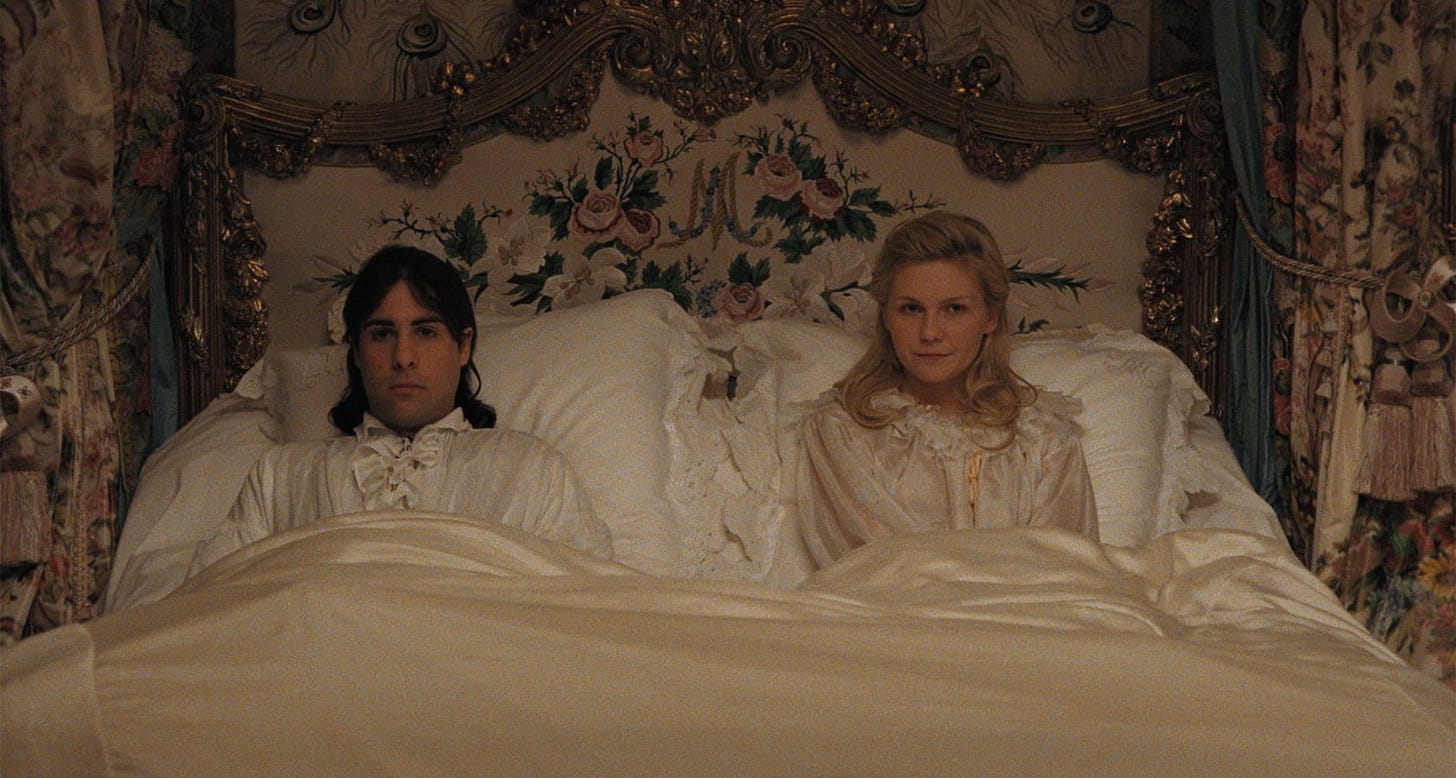 Marie Antoinette | Still features Kirsten Dunst and Jason Schwartzman as Marie Antoinette and Louis XVI in bed.