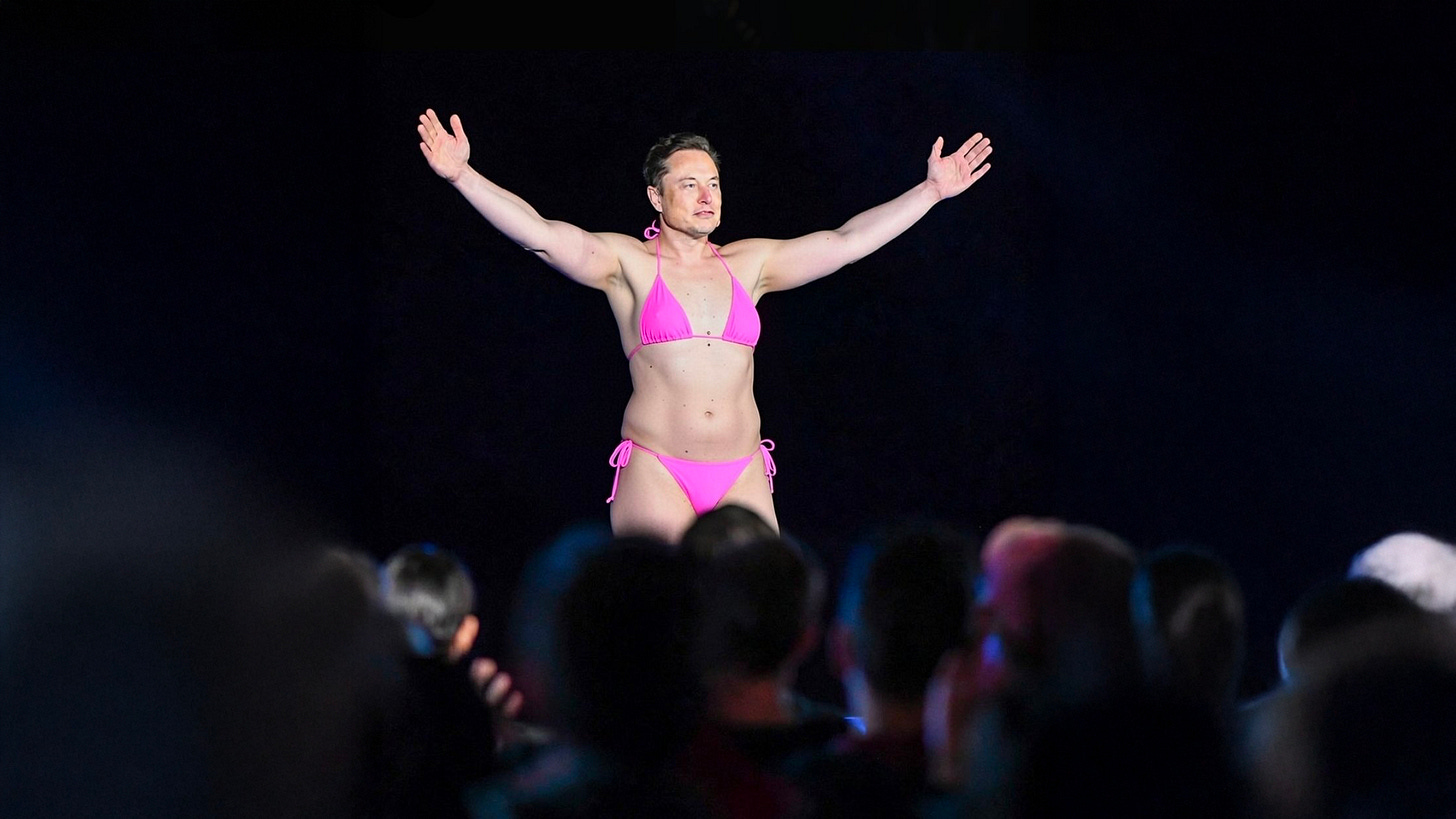 A partially AI-modified image based on a real photograph shows a man standing on a stage with his arms extended toward an audience, wearing a bright pink bikini. The figure and pose appear drawn from an original stage photo, with clothing digitally altered.