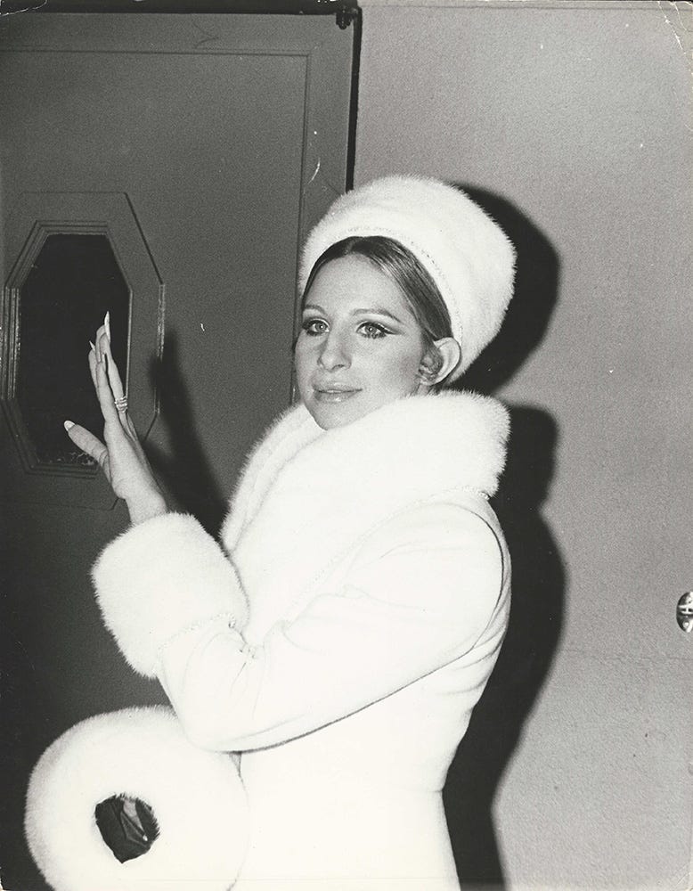 BARBRA STREISAND (1970) wears white fur at ...