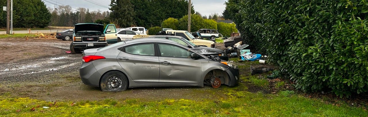 A car crashed into a pile of debris

Description automatically generated