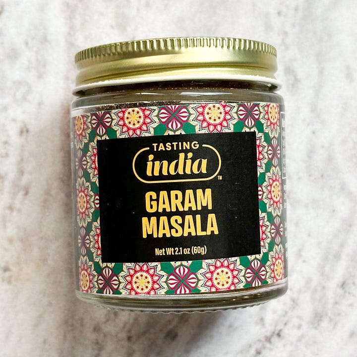 A bottle of garam masala and chai masala spice mix from Tasting India.