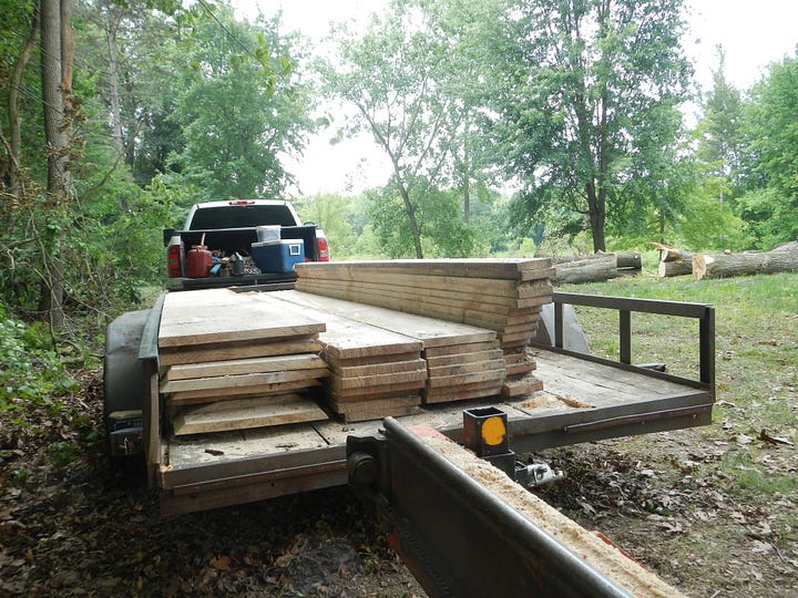 lumber from three logs ready for transport
