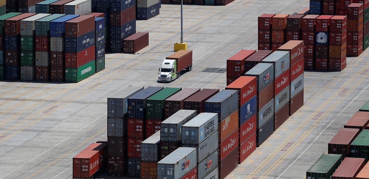 China-U.S. container shipping rates sail past $20,000 to record | Reuters
