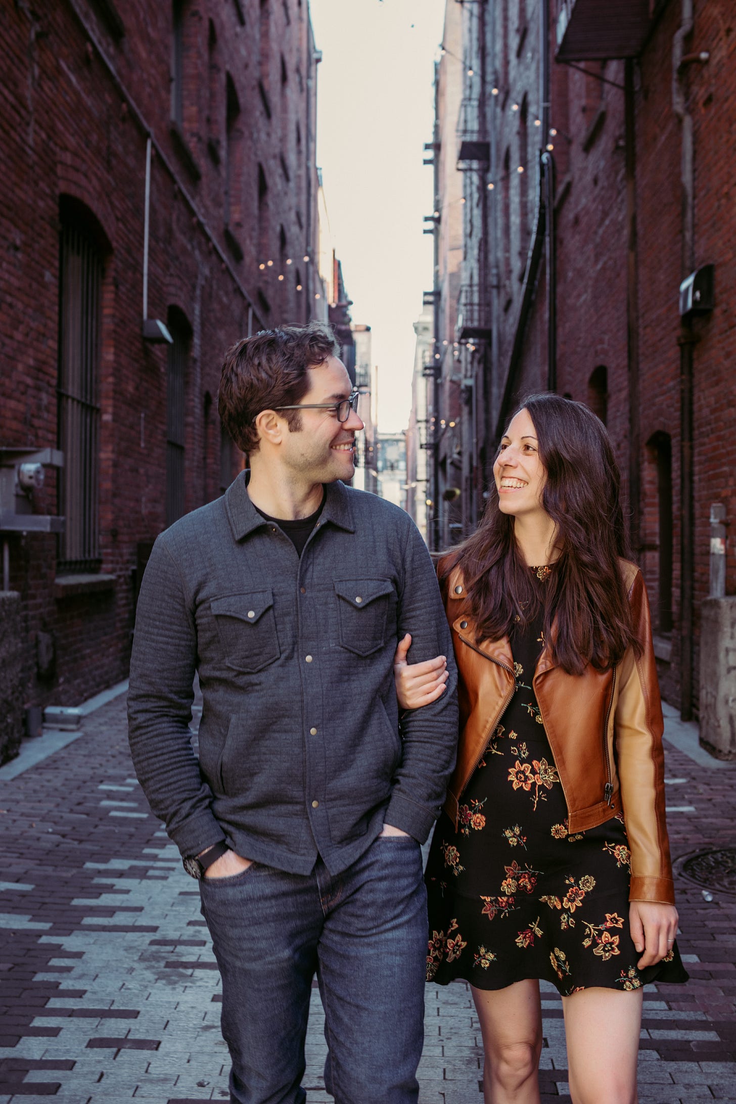 Photo of Nicole and Mike looking at each other and smiling