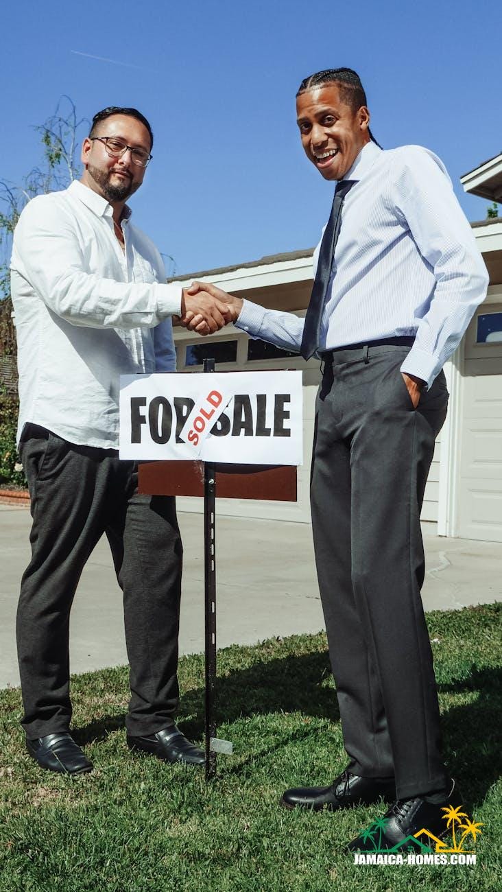 people in dress shirt shaking hands