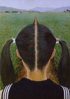 This may contain: the back of a woman's head with long black hair and two ponytails