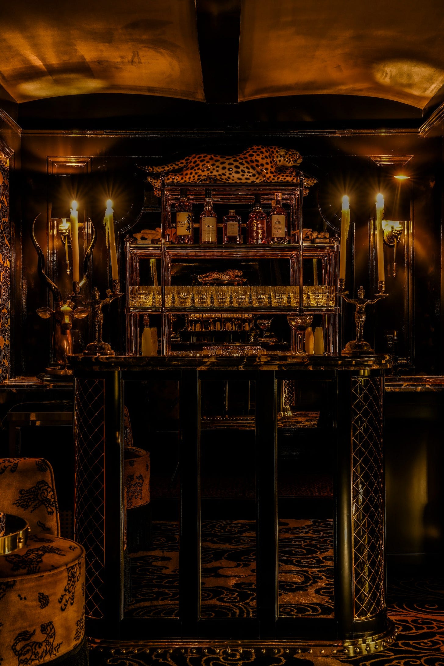 Image may contain Bar Person Chair Furniture and Candle