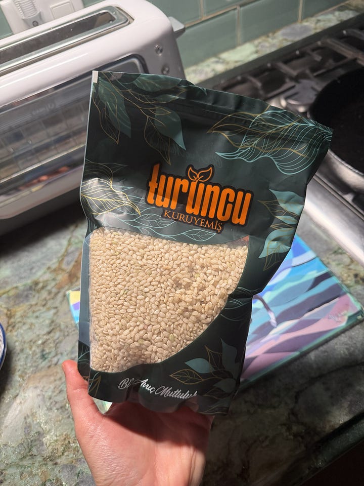 photo of a fruit and nut shop in an airport and a bag of short grain brown rice