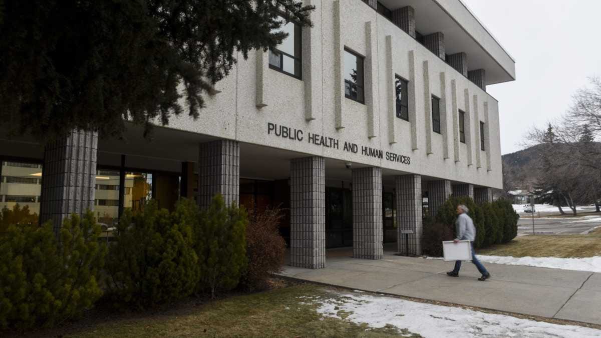 A person walks into the building housing the Montana Department of Public Health and Human Services in Helena on Wednesday, Jan. 25, 2023. A person walks into the building housing the Montana Department of Public Health and Human Services in Helena on Wednesday, Jan. 25, 2023.