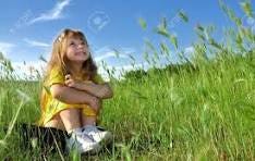 Little Girl Dreaming On The Grass Stock Photo, Picture And ...