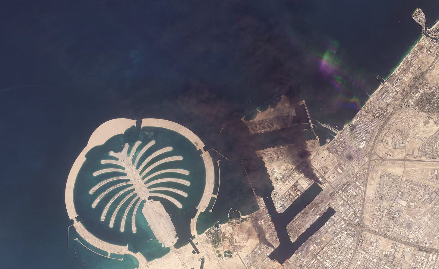 A satellite image of Jebel Ali Port, after one of the berths caught fire because of debris from an intercepted missile, in Dubai, United Arab Emirates, March 1. via Planet Labs PBC A satellite image of Jebel Ali Port, after one of the berths caught fire because of debris from an intercepted missile, in Dubai, United Arab Emirates, March 1. via Planet Labs PBC