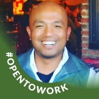 Jonas smiling with an "open to work" banner around his headshot
