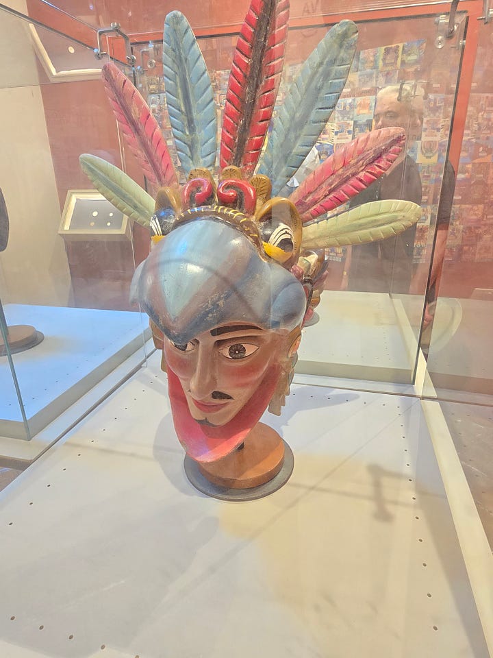 Fuerte de San Diego entrance, cannon, model ship, headdress sculpture