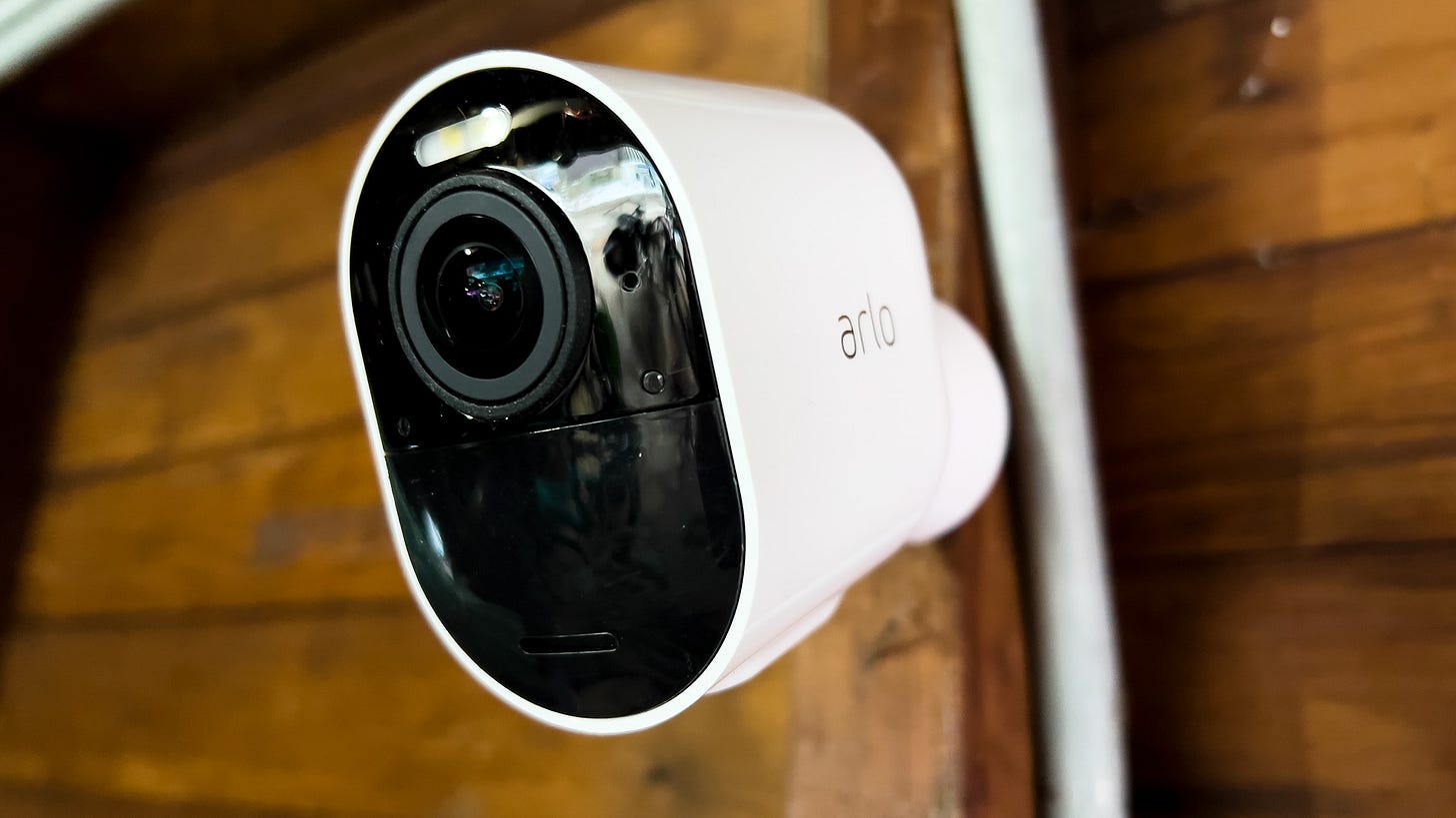 An Arlo Ultra 2 attached to a wall An Arlo Ultra 2 attached to a wall