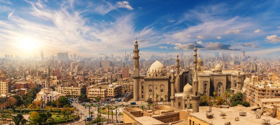 The city of Cairo, with very few trees, and a blazing sun The city of Cairo, with very few trees, and a blazing sun