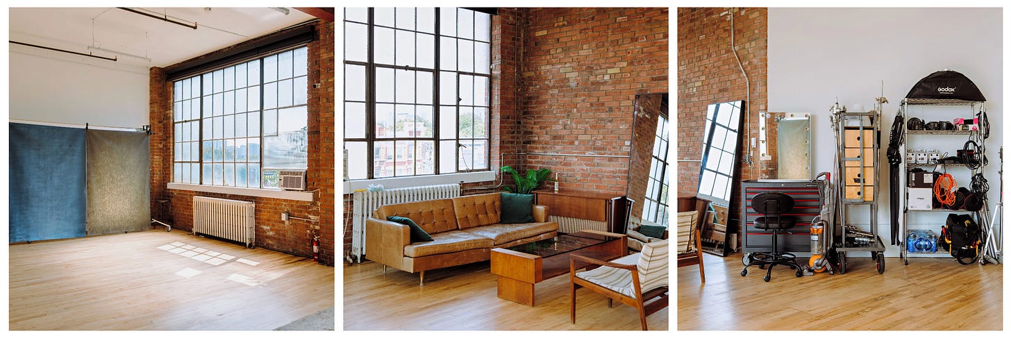 A sunlit brick studio space with large industrial windows, shown in three views: an open area with fabric backdrops, a leather couch seating setup for conversation, and a shelving unit filled with filming and photography equipment. A sunlit brick studio space with large industrial windows, shown in three views: an open area with fabric backdrops, a leather couch seating setup for conversation, and a shelving unit filled with filming and photography equipment.