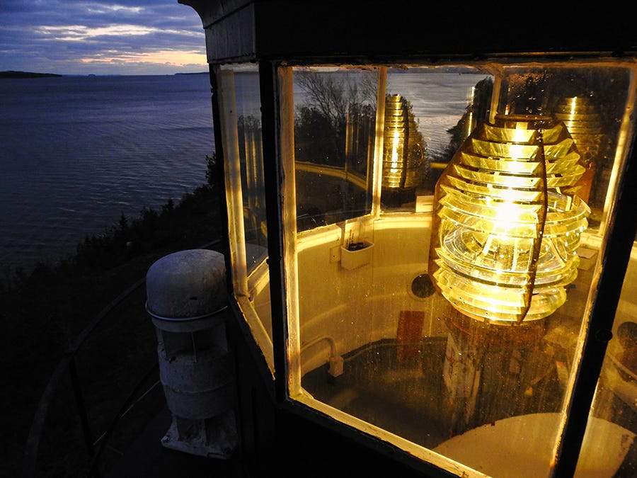 The fourth order Fresnel lens aglow at Fort Point Lighthouse, Stockton Springs, Maine. The fourth order Fresnel lens aglow at Fort Point Lighthouse, Stockton Springs, Maine.