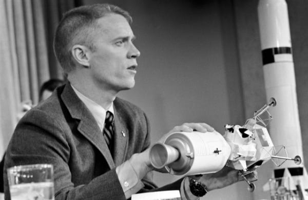 Apollo 9 lunar module pilot Russell L. Schweickart uses a model during a press conference at the Grumman Aircraft Engineering Corporation on January 25, 1969. (Credit: unknown) Apollo 9 lunar module pilot Russell L. Schweickart uses a model during a press conference at the Grumman Aircraft Engineering Corporation on January 25, 1969. (Credit: unknown)