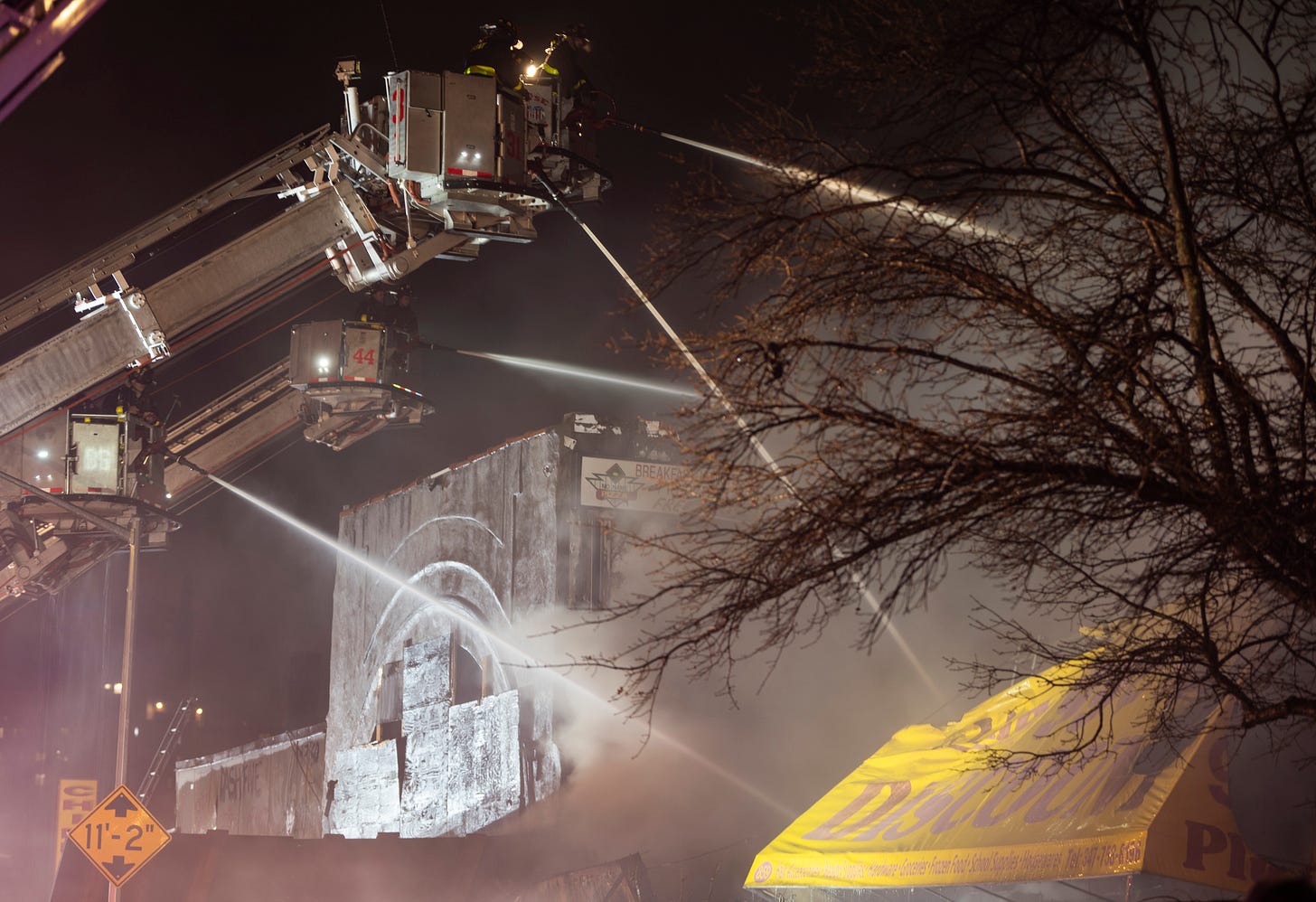 Multiple tower ladders operated in an attempt to knock down heavy fire throughout multiple commercial buildings at 558 Prospect Avenue on Thursday, December 18. Multiple tower ladders operated in an attempt to knock down heavy fire throughout multiple commercial buildings at 558 Prospect Avenue on Thursday, December 18.