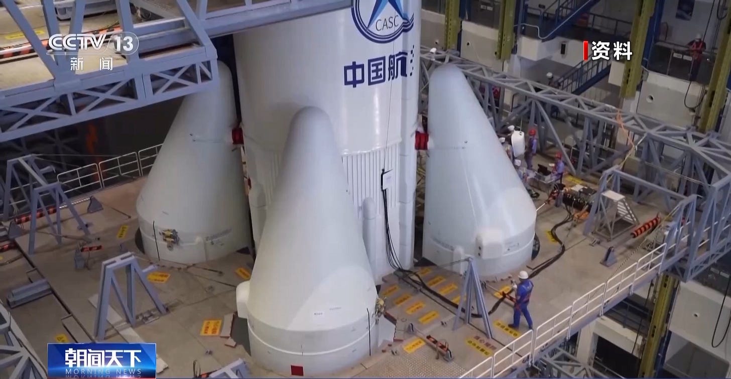 The Long March 5B Y6 vehicle during launch preparations inside the Wenchang Space Launch Site’s vehicle assembly building. The Long March 5B Y6 vehicle during launch preparations inside the Wenchang Space Launch Site’s vehicle assembly building.
