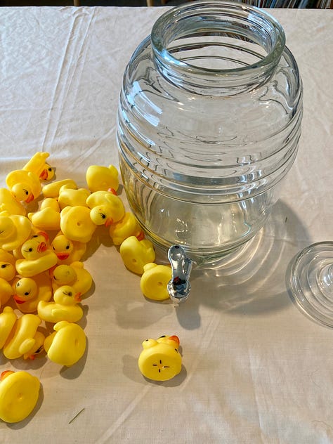 Floating ducks in water tank