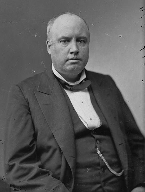 Black and white photo of Robert Ingersoll in 3-piece suit