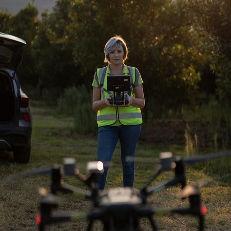 a DJI Matrice drone is setup and takes off ahead of a survey over macadamia trees in South Africa