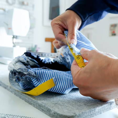 measuring the circumference of the diy bonnet with measuring tape measuring the circumference of the diy bonnet with measuring tape