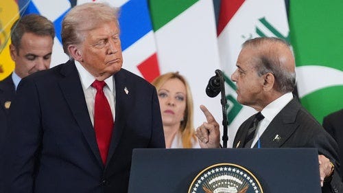 President Donald Trump listens as Pakistan's Prime Minister Shehbaz Sharif speaks at a podium President Donald Trump listens as Pakistan's Prime Minister Shehbaz Sharif speaks at a podium
