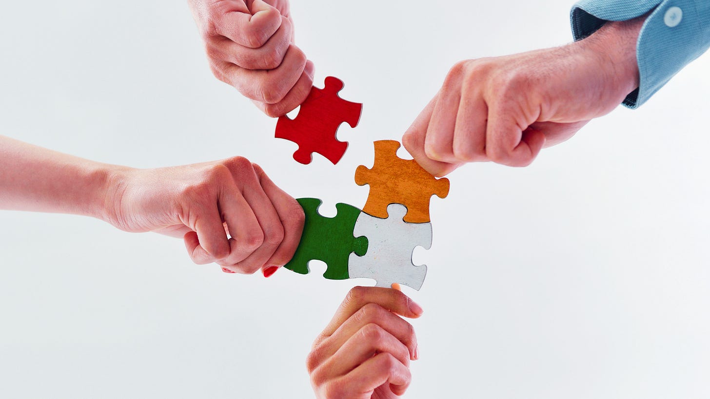 Philippe Heilberg on The Engine of Innovation: Why Teams Matter More Than Strategy. Image of 4 hands joining puzzle pieces together. Philippe Heilberg on The Engine of Innovation: Why Teams Matter More Than Strategy. Image of 4 hands joining puzzle pieces together.