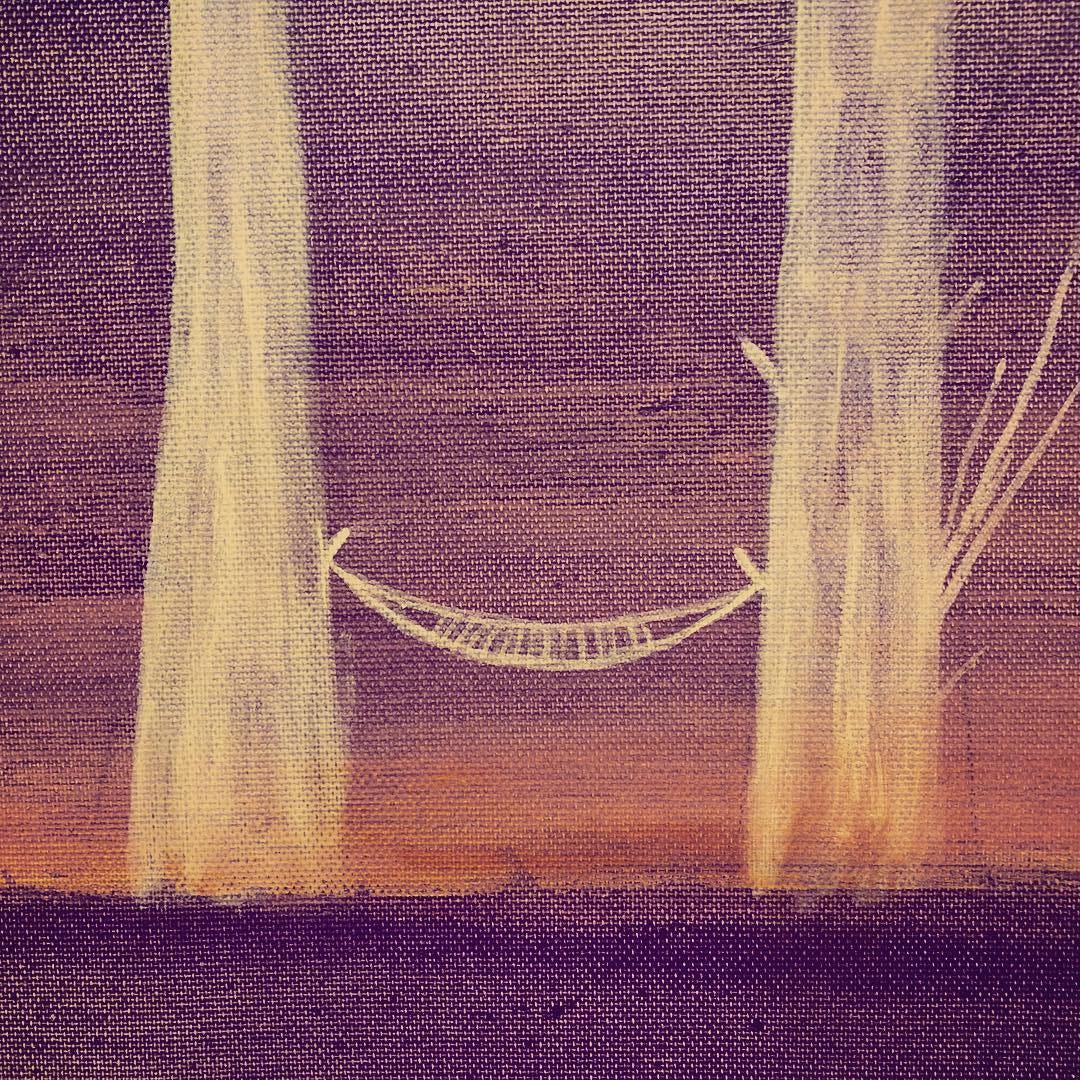 AN EMPTY HAMMOCK.
