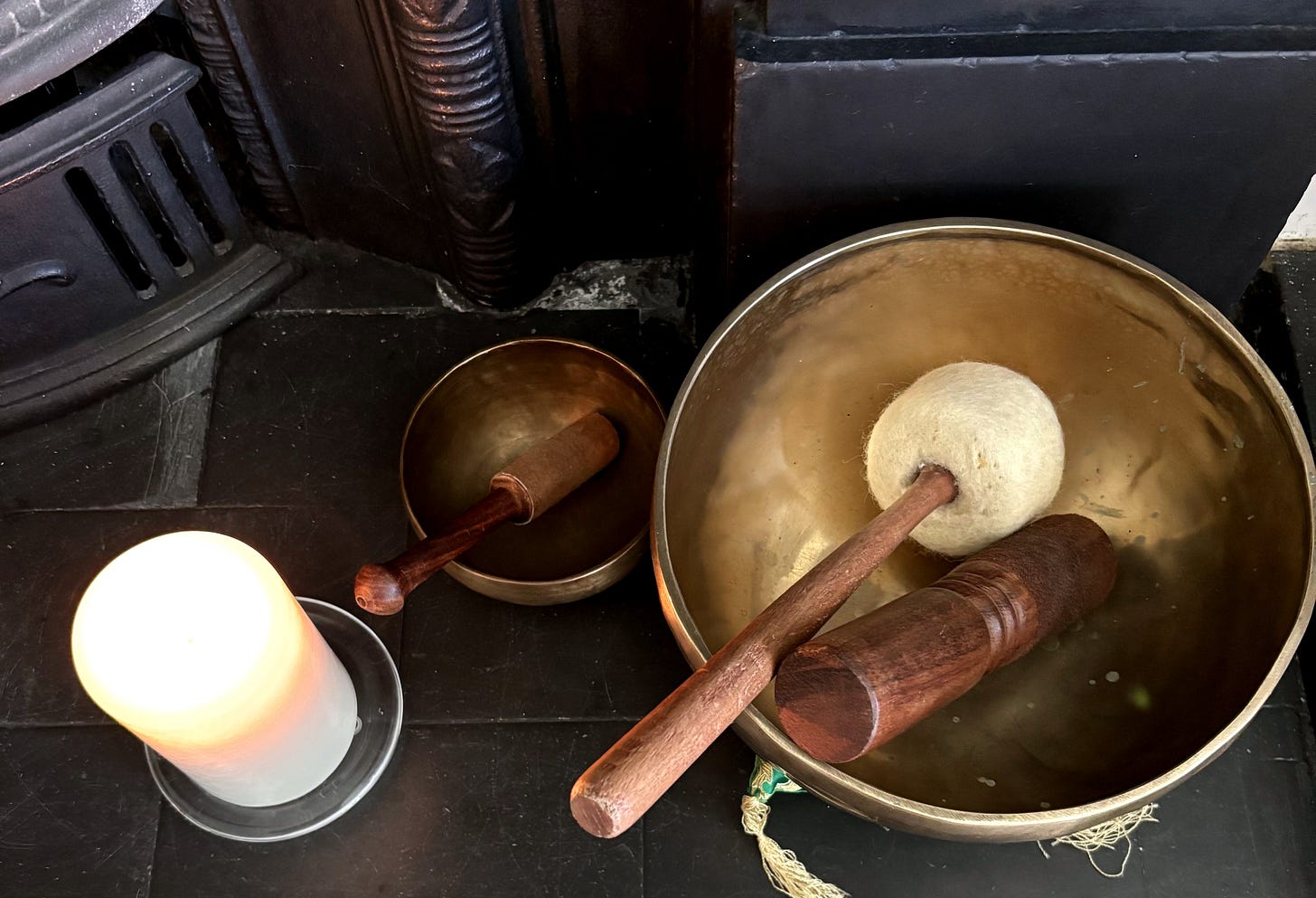 Tibetam singing bowls and lit candle