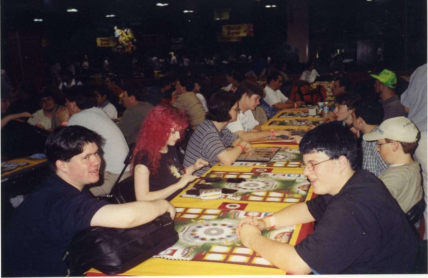 A photograph of Jim, Echidna, Purity, and IndigoMaster at the Pokémon TCG East Coast Super Trainer Showdown in 2001 A photograph of Jim, Echidna, Purity, and IndigoMaster at the Pokémon TCG East Coast Super Trainer Showdown in 2001
