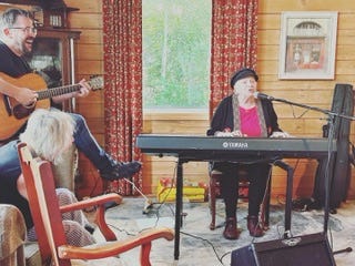 Saturday am cafe music in St. Peter’s, fireworks farewell, Kitchen Party, Flo Sampson and nephew, welcome banner, Barra Strait Bridge in Bras d’Or Lake, oatcakes from High Wheeler Cafe in Baddeck(recommend!), grocery portage.