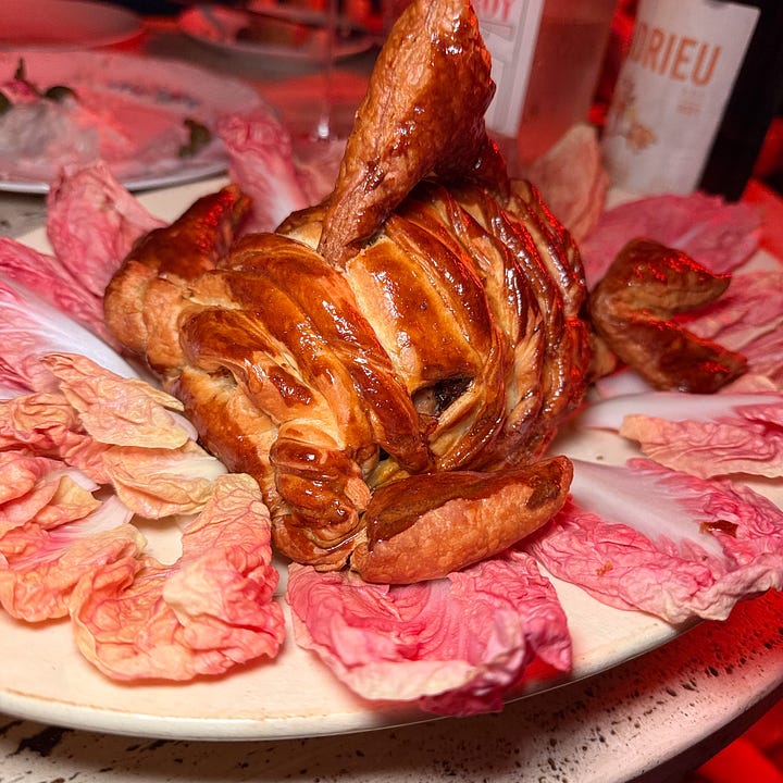 Pork with anchovies in a pastry crust at Augustin Marchand d'Vins, Paris