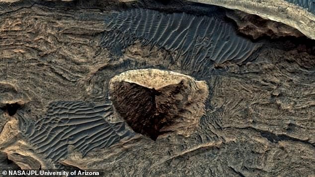A mysterious pyramid-like structure spotted on Mars has sparked theories that an ancient civilization such as ours could have once existed on the red planet A mysterious pyramid-like structure spotted on Mars has sparked theories that an ancient civilization such as ours could have once existed on the red planet