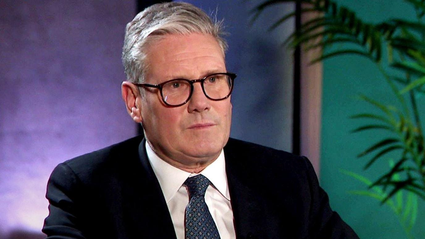 Sir Keir Starmer. He is wearing a blue suit, blue tie with a blue pattern, white shirt, and being interviewed on BBC Breakfast Sir Keir Starmer. He is wearing a blue suit, blue tie with a blue pattern, white shirt, and being interviewed on BBC Breakfast