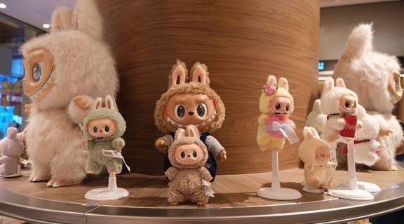 A group of stuffed animals on a table

AI-generated content may be incorrect.