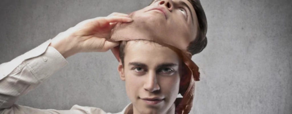 Man removing a mask that is identical to his own face.