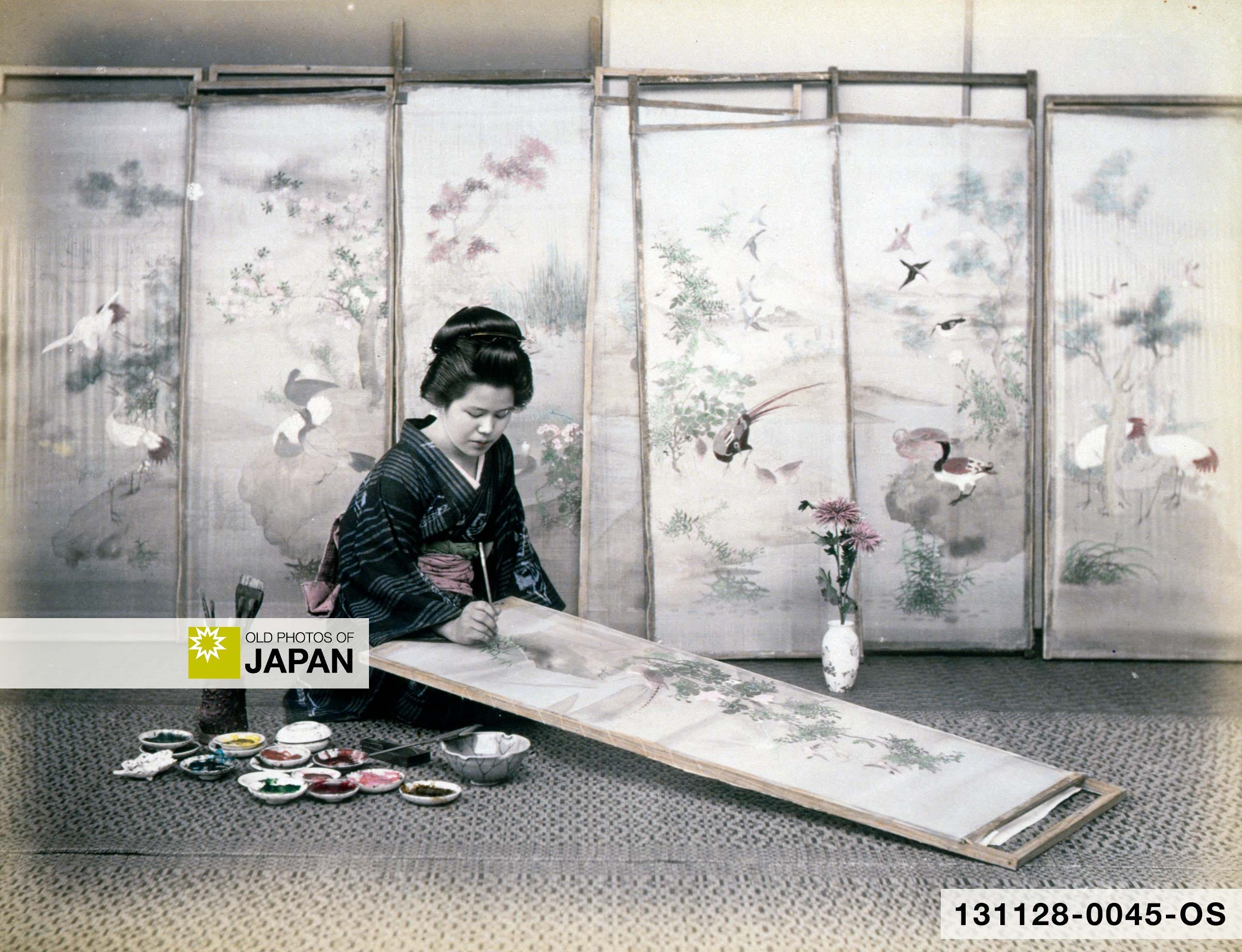 A female Japanese artist paints a traditional painting on a screen, 1880s A female Japanese artist paints a traditional painting on a screen, 1880s